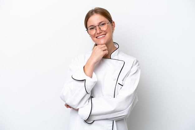 Довольный повар в кухне